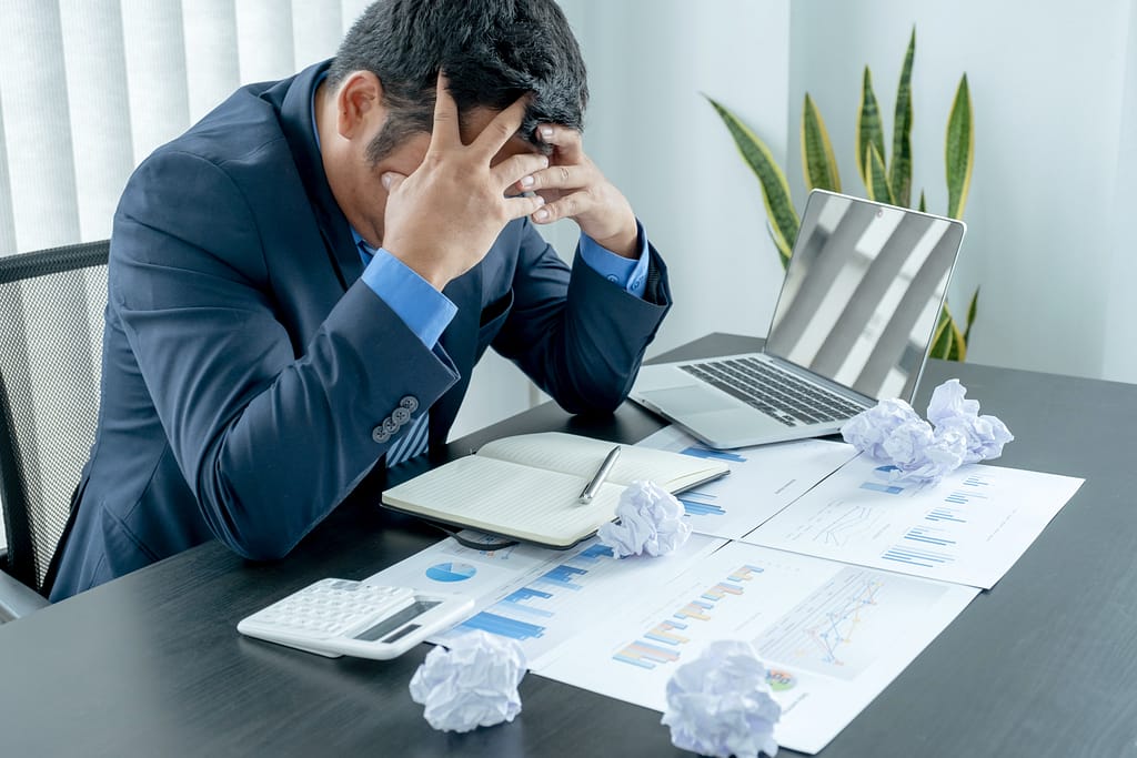 Businessman acted with tired stress anxiety from the frustrated